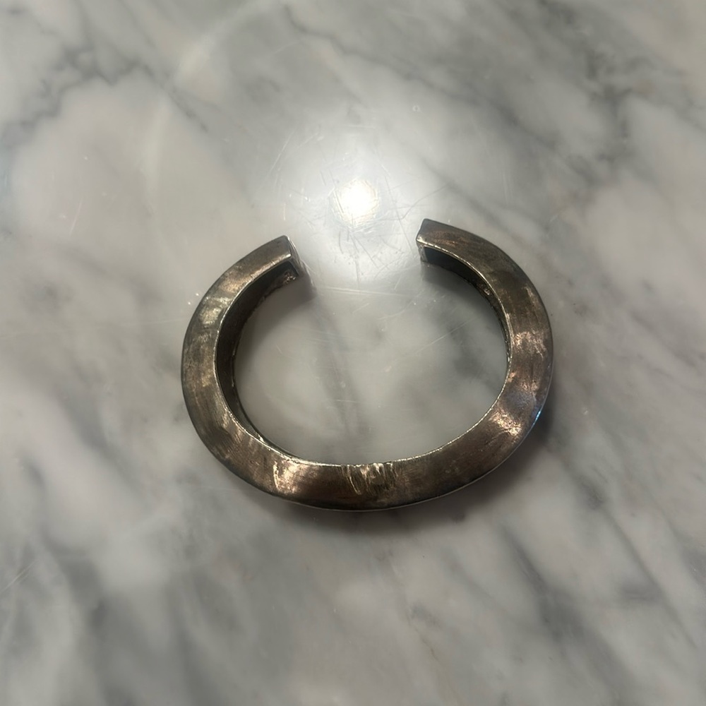 Heavyweight distressed silver bracelet.